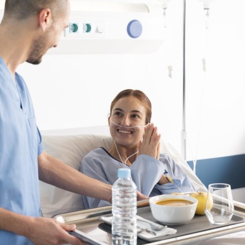 close-up-nurse-holding-food-tray